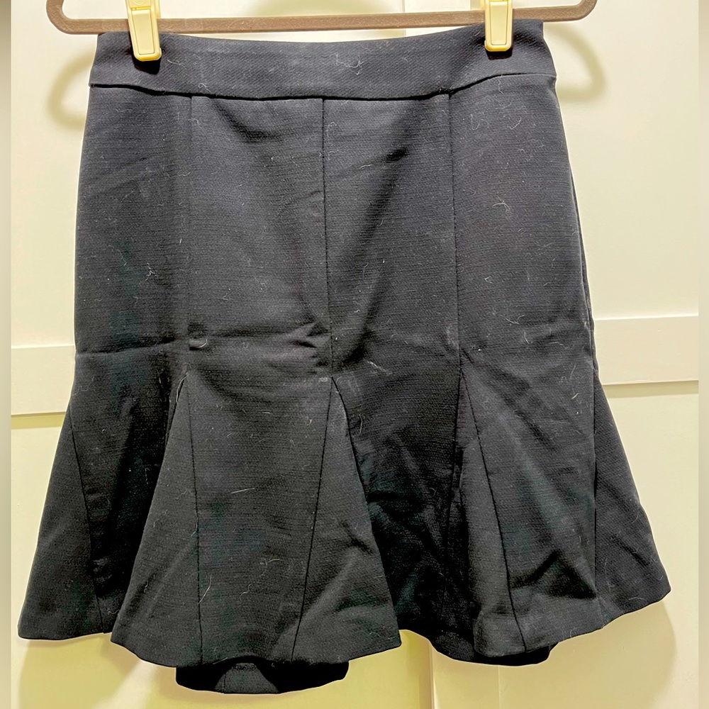 Banana Republic black fluted mini skirt in size 4